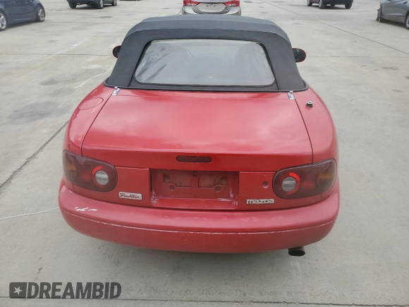 1994 Mazda MX-5 Miata with VIN JM1NA3530R0500986, listed as a Copart auction lot 59203705 with 241,135 mi miles and Salvage title. Bid and sale history available at DreamBid. Image 6.