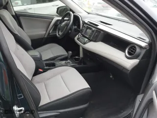 2018 Toyota RAV4 XLE with VIN JTMRFREV6JJ248098, listed as a IAAI auction lot 42042239 with 74,765 mi miles. Bid and sale history available at carsss.com. Image 5.