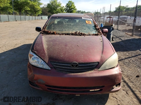 2004 Toyota Camry LE z VIN 4T1BE30K44U299631, wystawiony jako Copart lot #53949745 z przebiegiem 247 444 mil mil oraz Szkoda całkowita • Salvage title. Historia ofert i sprzedaży dostępna na DreamBid. Obrazek 5.