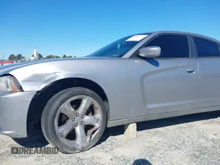 2014 Dodge Charger SXT with VIN 2C3CDXHG6EH166994, listed as a IAAI auction lot 41801739 with 163,314 mi miles. Bid and sale history available at carsss.com. Image 6.