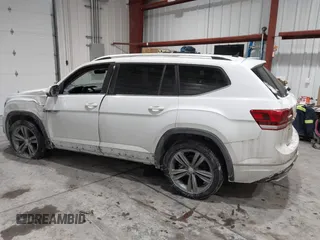 2019 Volkswagen Atlas SE z VIN 1V2XR2CA0KC595596, wystawiony jako IAAI lot #41410019 z przebiegiem 103 336 mil mil oraz . Historia ofert i sprzedaży dostępna na DreamBid. Obrazek 15.