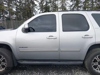 2012 GMC Yukon SLT with VIN 1GKS2CE03CR324366, listed as a IAAI auction lot 41473131 with 161,847 mi miles. Bid and sale history available at carsss.com. Image 14.