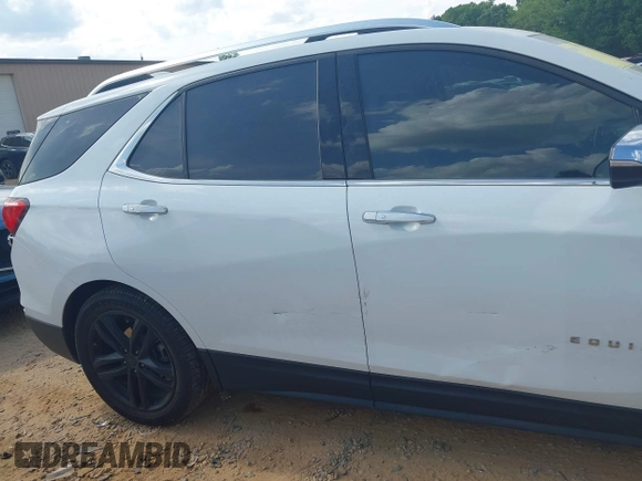2019 Chevrolet Equinox Premier z VIN 2GNAXPEX9K6177386, wystawiony jako IAAI lot #42172103 z przebiegiem 61 045 mil mil oraz . Historia ofert i sprzedaży dostępna na DreamBid. Obrazek 18.