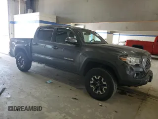 2021 Toyota Tacoma SR with VIN 3TMCZ5ANXMM425903, listed as a Copart auction lot 57963425 with 61,458 mi miles and Salvage title. Bid and sale history available at DreamBid. Image 4.