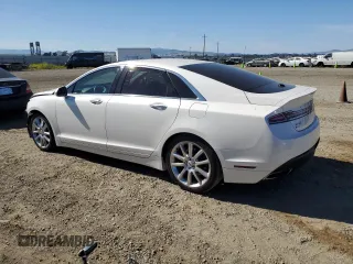 2016 Lincoln MKZ z VIN 3LN6L2G90GR600752, wystawiony jako Copart lot #56599625 z przebiegiem 73 275 mil mil oraz Szkoda całkowita • Salvage title. Historia ofert i sprzedaży dostępna na DreamBid. Obrazek 2.