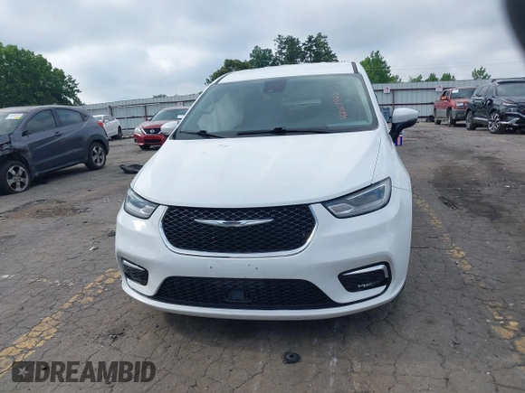 2023 Chrysler Pacifica Touring L with VIN 2C4RC1BG8PR535446, listed as a IAAI auction lot 42307923 with 65,718 mi miles and . Bid and sale history available at DreamBid. Image 12.