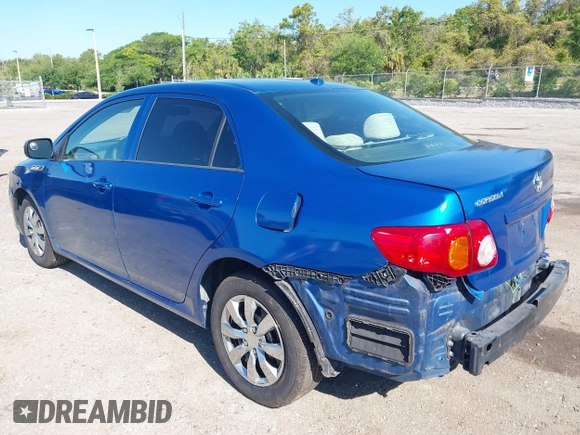 2009 Toyota Corolla with VIN JTDBL40E999021523, listed as a IAAI auction lot 42019856 with 194,011 mi miles. Bid and sale history available at carsss.com. Image 3.