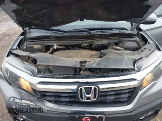 2018 Honda Ridgeline RTL with VIN 5FPYK3F52JB002649, listed as a IAAI auction lot 42338360 with 68,802 mi miles and . Bid and sale history available at DreamBid. Image 10.