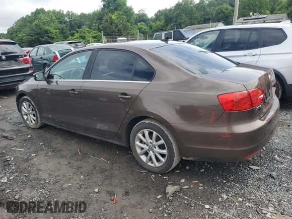 2013 Volkswagen Jetta SE with VIN 3VWDP7AJ8DM431330, listed as a Copart auction lot 56738795 with 114,151 mi miles and Salvage title. Bid and sale history available at DreamBid. Image 2.