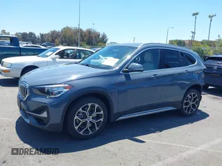 2021 BMW X1 sDrive28i z VIN WBXJG7C02M5T37169, wystawiony jako IAAI lot #42226396 z przebiegiem 48 603 mil mil oraz . Historia ofert i sprzedaży dostępna na DreamBid. Obrazek 15.