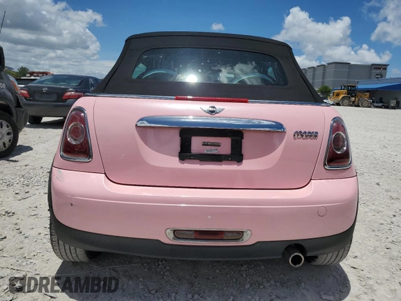 2013 MINI Convertible with VIN WMWZN3C50DT568977, listed as a Copart auction lot 60726495 with 86,319 mi miles and Clean title. Bid and sale history available at DreamBid. Image 6.