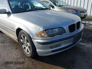 1999 BMW 3 Series 323i with VIN WBAAM3330XKC56332, listed as a IAAI auction lot 41200762 with 157,004 mi miles. Bid and sale history available at carsss.com. Image 6.
