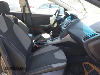 2012 Ford Focus SE with VIN 1FAHP3F25CL335319, listed as a IAAI auction lot 42079047 with 173,443 mi miles. Bid and sale history available at carsss.com. Image 4.