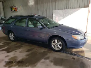 2001 Ford Taurus SE Standard with VIN 1FAHP58S71G184725, listed as a Copart auction lot 56401895 with 163,238 mi miles and Salvage title. Bid and sale history available at DreamBid. Image 4.