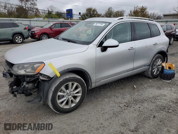 2013 Volkswagen Touareg Lux with VIN WVGEF9BPXDD004537, listed as a Copart auction lot 79277734 with 105,091 mi miles and Salvage Title. Bid and sale history available at DreamBid. Image 1.