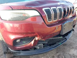2019 Jeep Cherokee Latitude Plus with VIN 1C4PJMLB9KD410730, listed as a IAAI auction lot 41762344 with 82,097 mi miles and . Bid and sale history available at carsss.com. Image 6.