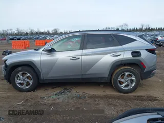 2022 Hyundai Tucson SEL z VIN 5NMJBCAE3NH070531, wystawiony jako IAAI lot #41222494 z przebiegiem 91 358 mil mil oraz . Historia ofert i sprzedaży dostępna na DreamBid. Obrazek 14.
