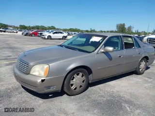 2004 Cadillac DeVille with VIN 1G6KD54Y44U121318, listed as a IAAI auction lot 41833122 with 152,258 mi miles. Bid and sale history available at carsss.com. Image 2.