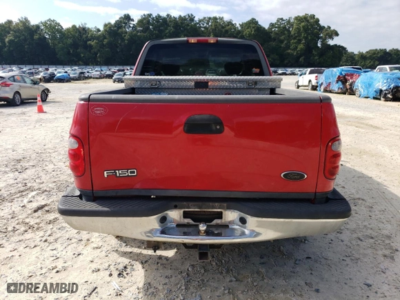 2003 Ford F-150 XL with VIN 1FTRX07WX3KD51374, listed as a Copart auction lot 71796464 with 130,319 mi miles and Salvage Title. Bid and sale history available at carsss.com. Image 6.