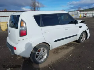 2010 Kia Soul + with VIN KNDJT2A20A7701556, listed as a IAAI auction lot 41814987 with 201,712 mi miles. Bid and sale history available at carsss.com. Image 4.
