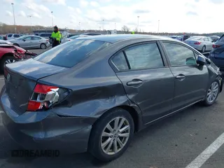 2012 Honda Civic EX-L with VIN 2HGFB2F94CH307646, listed as a IAAI auction lot 42006923 with 260,917 mi miles and . Bid and sale history available at DreamBid. Image 18.