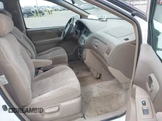 2001 Toyota Sienna LE with VIN 4T3ZF13C21U364354, listed as a IAAI auction lot 41991518 with 198,678 mi miles. Bid and sale history available at carsss.com. Image 5.
