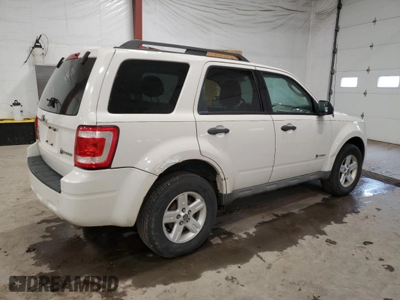 2009 Ford Escape Hybrid with VIN 1FMCU59399KC34999, listed as a Copart auction lot 53332225 with 200,112 mi miles and Clean title. Bid and sale history available at DreamBid. Image 3.
