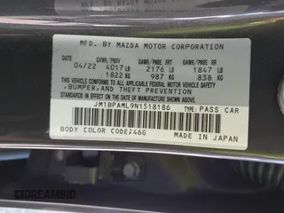 2022 Mazda Mazda3 Hatchback Premium with VIN JM1BPAML9N1518186, listed as a IAAI auction lot 42074112 with 23,722 mi miles. Bid and sale history available at carsss.com. Image 9.