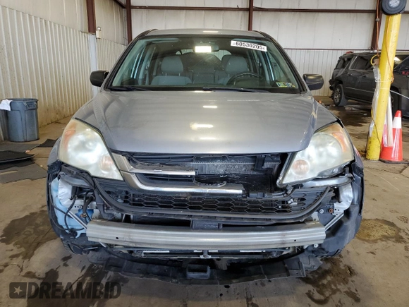 2011 Honda CR-V LX z VIN 5J6RE4H3XBL058952, wystawiony jako Copart lot #60530205 z przebiegiem 165 349 mil mil oraz Szkoda całkowita • Salvage title. Historia ofert i sprzedaży dostępna na DreamBid. Obrazek 5.