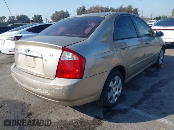 2004 Kia Spectra LX with VIN KNAFE122145013930, listed as a IAAI auction lot 41627031 with 93,565 mi miles. Bid and sale history available at carsss.com. Image 4.