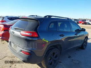 2016 Jeep Cherokee Sport with VIN 1C4PJLAS4GW329773, listed as a IAAI auction lot 41300023 with 101,912 mi miles and . Bid and sale history available at DreamBid. Image 4.