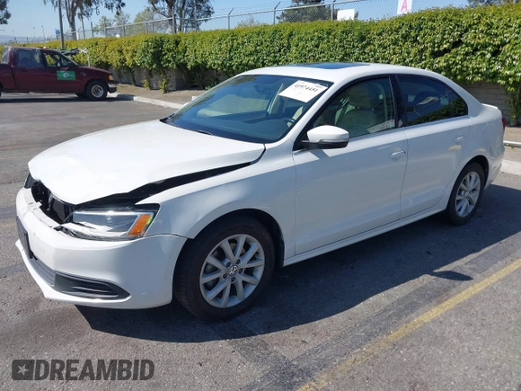 2013 Volkswagen Jetta SE with VIN 3VWDP7AJ9DM253878, listed as a IAAI auction lot 41974451 with 149,720 mi miles and . Bid and sale history available at DreamBid. Image 2.