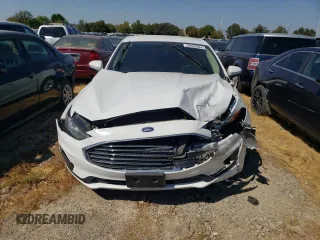 2020 Ford Fusion SE z VIN 3FA6P0LU6LR216269, wystawiony jako Copart lot #68509044 z przebiegiem 60 556 mil mil oraz Szkoda całkowita • Salvage title. Historia ofert i sprzedaży dostępna na DreamBid. Obrazek 5.