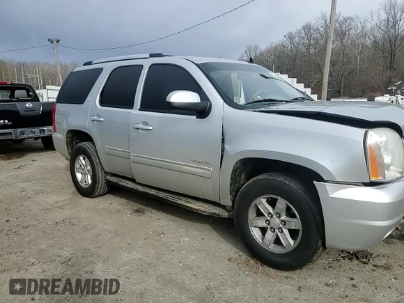 2012 GMC Yukon SLT with VIN 1GKS1CE08CR203822, listed as a Copart auction lot 82955253 with 122,508 mi miles and Salvage Title. Bid and sale history available at carsss.com. Image 12.