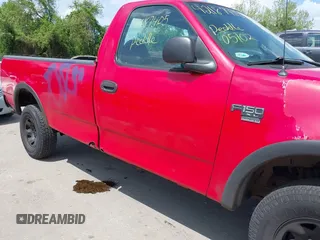2000 Ford F-150 XL with VIN 1FTPF18LXYNA72484, listed as a IAAI auction lot 42187405 with 233,334 mi miles and . Bid and sale history available at DreamBid. Image 14.