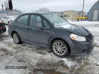 2011 Suzuki SX4 with VIN JS2YC5A44B6300171, listed as a Copart auction lot 87673685 with 116,483 mi miles and Salvage Title. Bid and sale history available at DreamBid. Image 4.