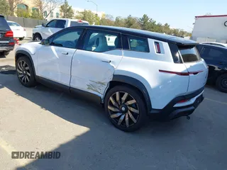 2023 Fisker Ocean Extreme z VIN VCF1EBU22PG009426, wystawiony jako IAAI lot #41963771 z przebiegiem Nie podano mil oraz . Historia ofert i sprzedaży dostępna na DreamBid. Obrazek 3.