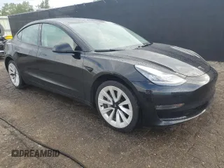 2023 Tesla Model 3 with VIN 5YJ3E1EA8PF438542, listed as a Copart auction lot 66329695 with 71,639 mi miles and Clean title. Bid and sale history available at DreamBid. Image 4.