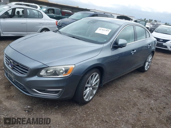 2017 Volvo S60 Inscription with VIN LYV402HK5HB154043, listed as a IAAI auction lot 41763769 with 136,736 mi miles. Bid and sale history available at carsss.com. Image 2.