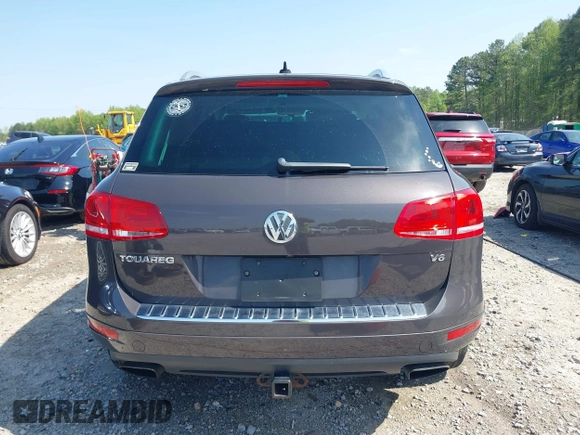 2012 Volkswagen Touareg Sport z VIN WVGEF9BPXCD011020, wystawiony jako IAAI lot #42000763 z przebiegiem 143 470 mil mil oraz . Historia ofert i sprzedaży dostępna na DreamBid. Obrazek 17.
