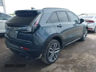 2019 Cadillac XT4 FWD Sport z VIN 1GYFZER49KF215843, wystawiony jako IAAI lot #41912861 z przebiegiem 102 922 mil mil oraz . Historia ofert i sprzedaży dostępna na DreamBid. Obrazek 4.