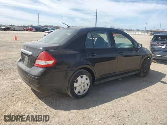 2010 Nissan Versa S with VIN 3N1BC1AP0AL409740, listed as a Copart auction lot 48996685 with 136,924 mi miles and Salvage Title. Bid and sale history available at DreamBid. Image 3.