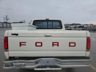 1990 Ford F-150 with VIN 1FTDF15Y6LPA89296, listed as a Copart auction lot 45693695 with 132,908 mi miles and Salvage Title. Bid and sale history available at carsss.com. Image 10.