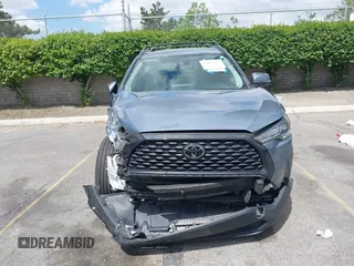 2022 Toyota Corolla Cross LE with VIN 7MUBAAAG1NV004852, listed as a IAAI auction lot 42251301 with 50,197 mi miles and . Bid and sale history available at DreamBid. Image 13.