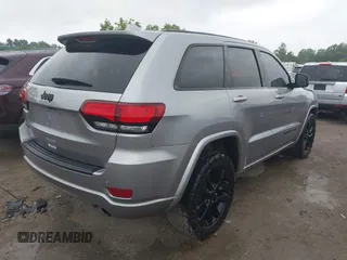 2018 Jeep Grand Cherokee Laredo E with VIN 1C4RJFAG6JC452859, listed as a IAAI auction lot 42647127 with 107,869 mi miles and . Bid and sale history available at DreamBid. Image 4.