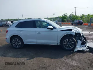 2021 Audi Q5 Premium Plus z VIN WA1BAAFYXM2050028, wystawiony jako IAAI lot #42479898 z przebiegiem 39 015 mil mil oraz . Historia ofert i sprzedaży dostępna na DreamBid. Obrazek 13.