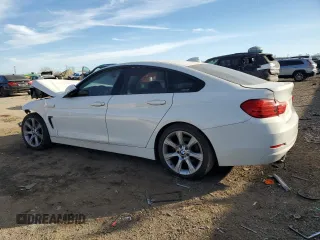 2015 BMW 4 Series 428i with VIN WBA4A9C55FGL86731, listed as a Copart auction lot 42700155 with 110,897 mi miles and Salvage title. Bid and sale history available at DreamBid. Image 2.
