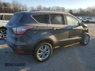 2018 Ford Escape SE z VIN 1FMCU9GD7JUA19262, wystawiony jako Copart lot #84627944 z przebiegiem 89 993 mil mil oraz Szkoda całkowita • Salvage title. Historia ofert i sprzedaży dostępna na DreamBid. Obrazek 3.