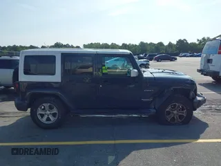 2017 Jeep Wrangler Unlimited Sahara with VIN 1C4HJWEG3HL648158, listed as a IAAI auction lot 42416132 with 95,954 mi miles and . Bid and sale history available at DreamBid. Image 13.