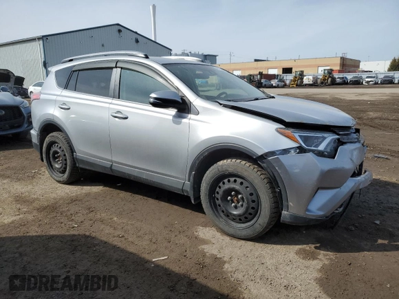 2018 Toyota RAV4 LE with VIN 2T3BFREV9JW754527, listed as a Copart auction lot 48119415 with 217,777 mi miles and Salvage Title. Bid and sale history available at carsss.com. Image 4.